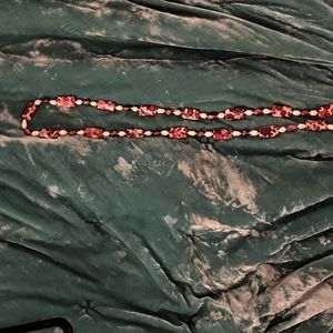 Long layering necklace. Pearls and floral beads